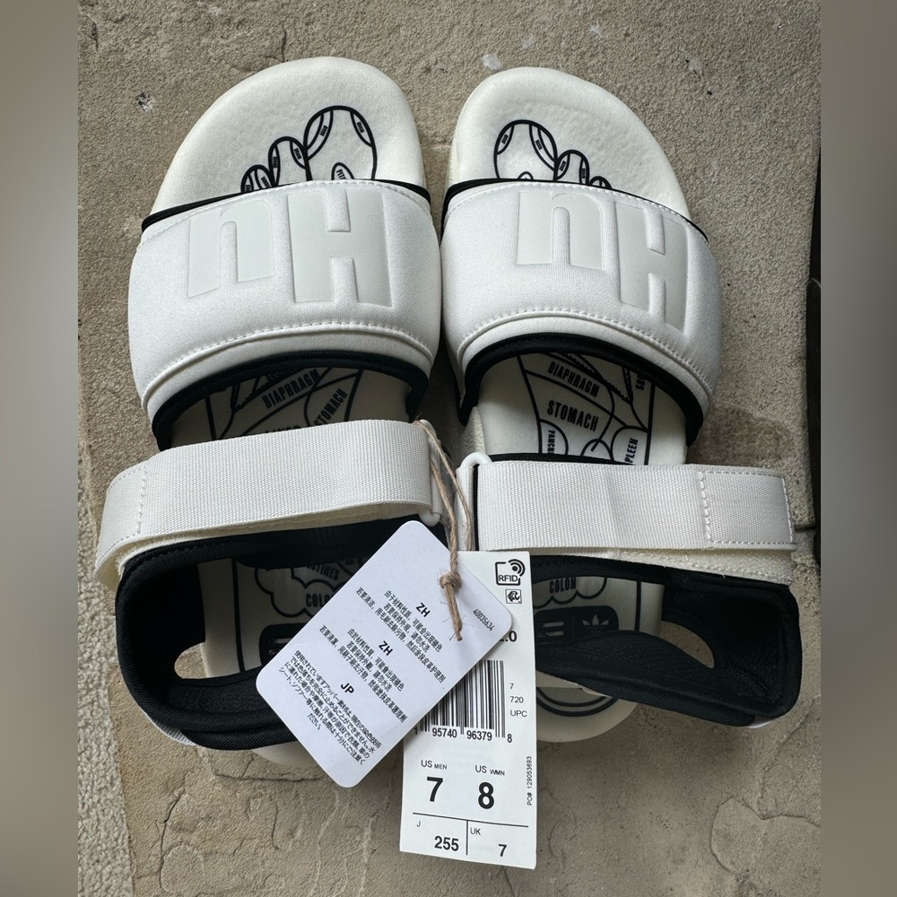 Hu The Pharrell x adidas Adilette 2.0 Slide ‘Off White”
